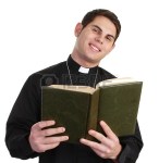 11235787-a-priest-with-a-bible