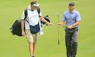 Golfer and Caddie