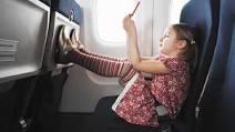 Young Girl On Airplane
