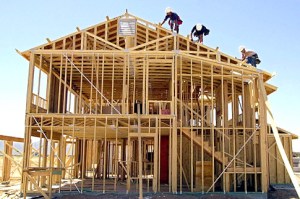 FILE---Workers frame a new home at a construction site in Suprise, Ariz., Thursday, April 26, 2001. Construction of new homes and apartments fell 3.3 percent in December but the total housing activity for the year managed a solid 2.2 percent increase, a remarkable achievement for an industry that normally is one of the hardest hit during a recession.(AP Photo/Matt York) Original Filename: ECONOMY_NY846.jpg